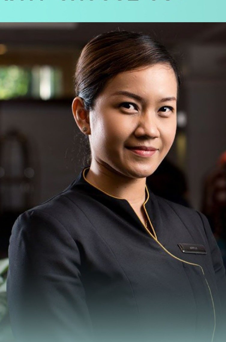 Hospitality team member in a branded Kenz uniform